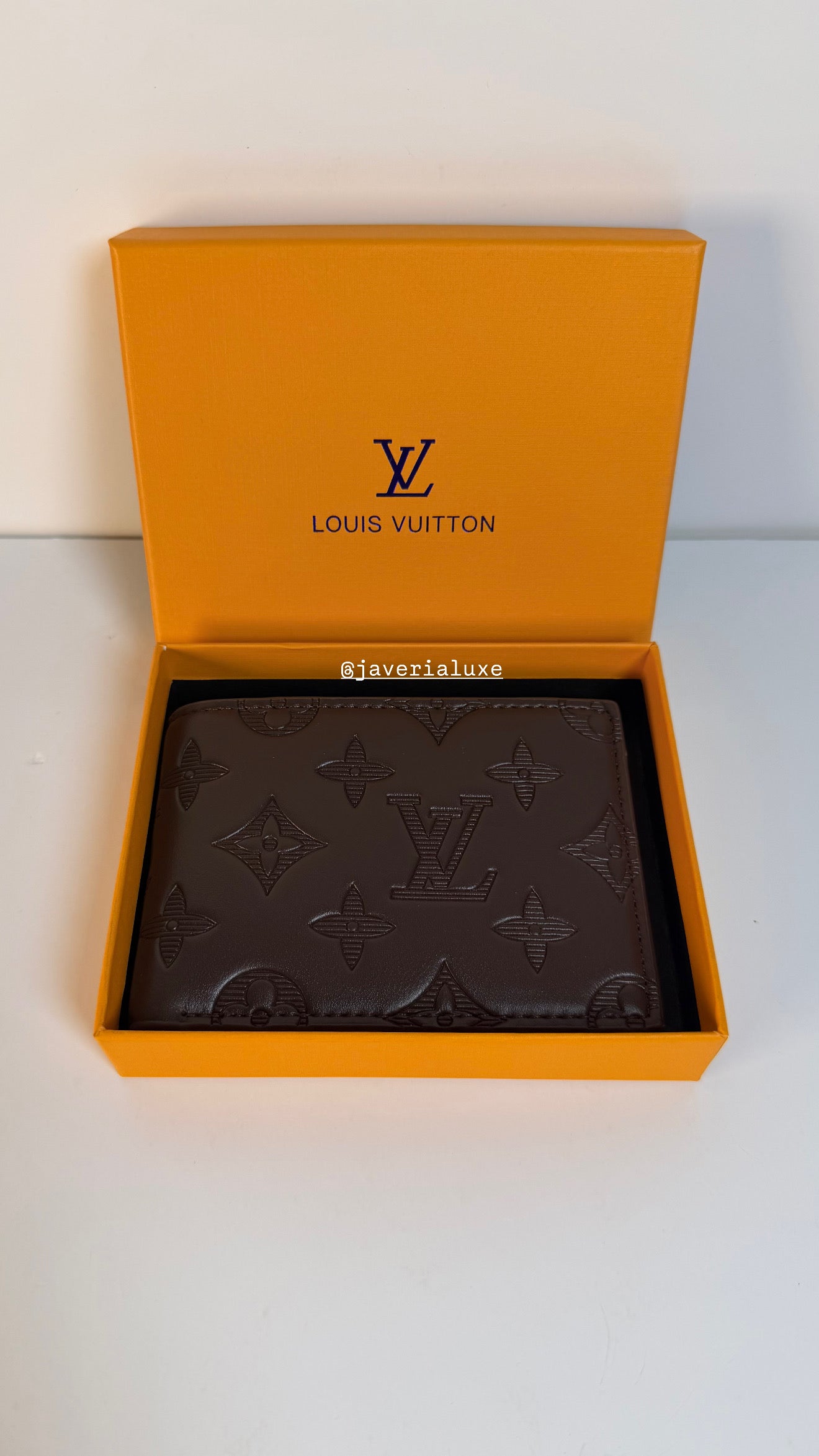 Louis Vuitton Engraved Monogram Embossed Leather Wallet- Brown