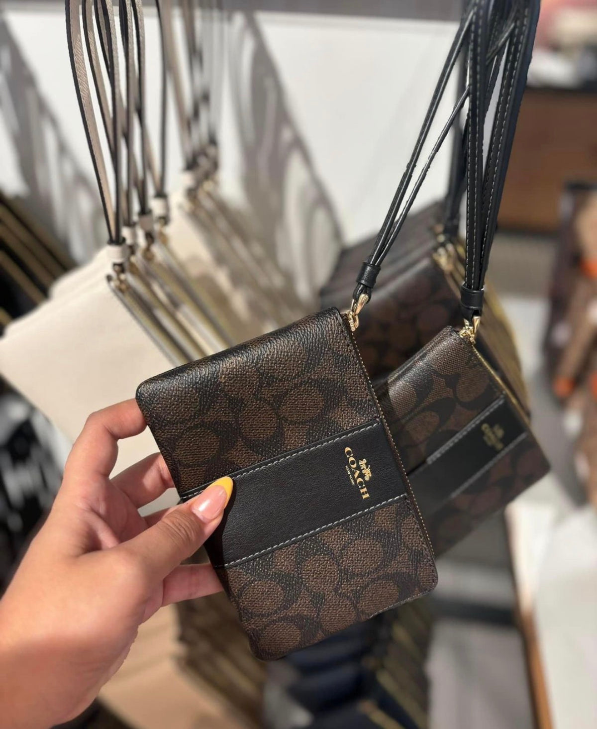 Coach Corner Zip Wristlet In Signature Canvas With Stripe - Coffee Brown