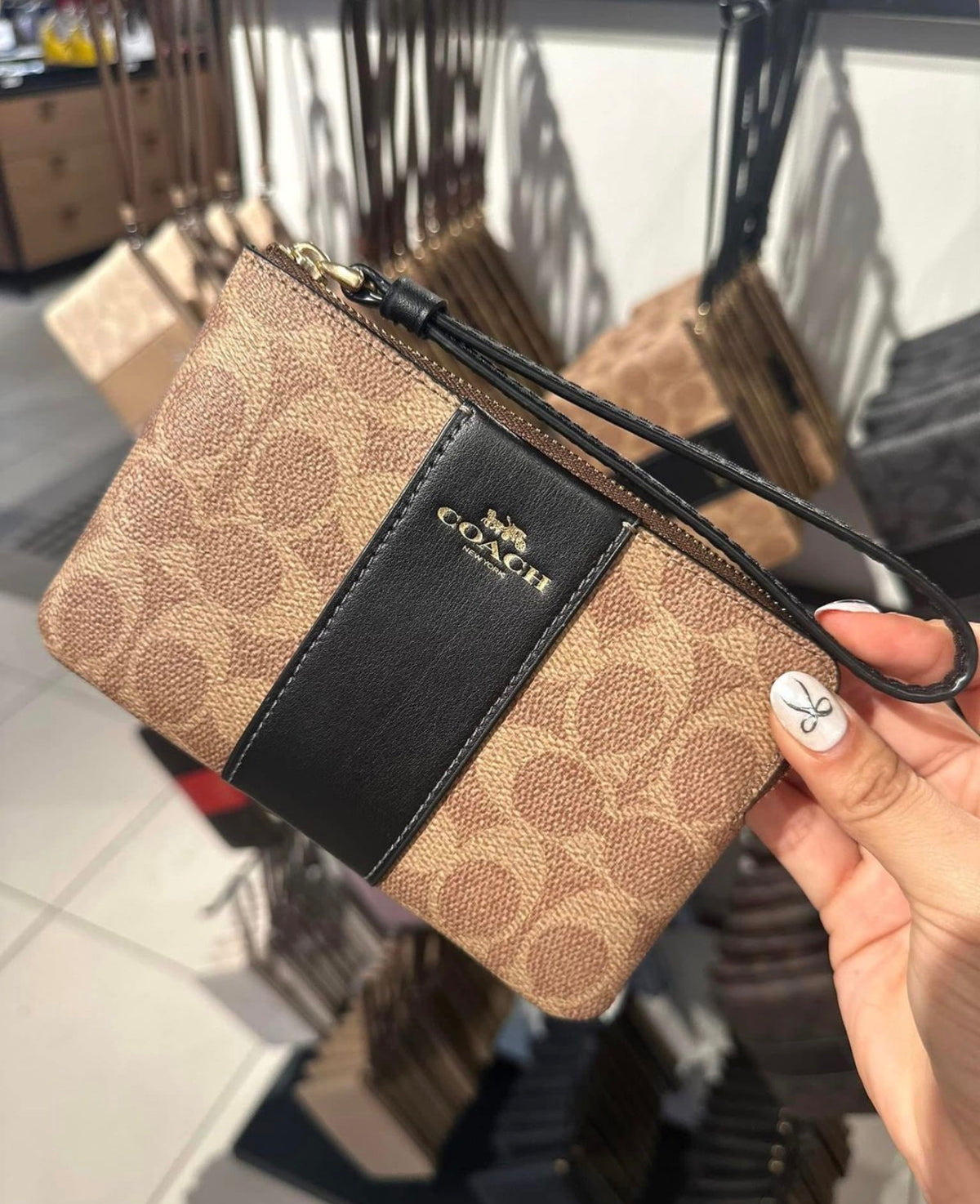 Coach Corner Zip Wristlet In Signature Canvas With Stripe - Brown