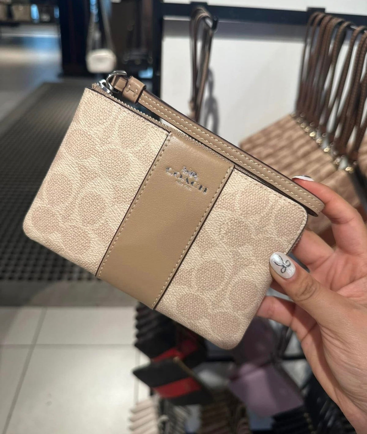 Coach Corner Zip Wristlet In Signature Canvas With Stripe - Beige