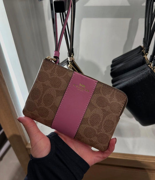 Coach Corner Zip Wristlet In Signature Canvas With Stripe - Pink