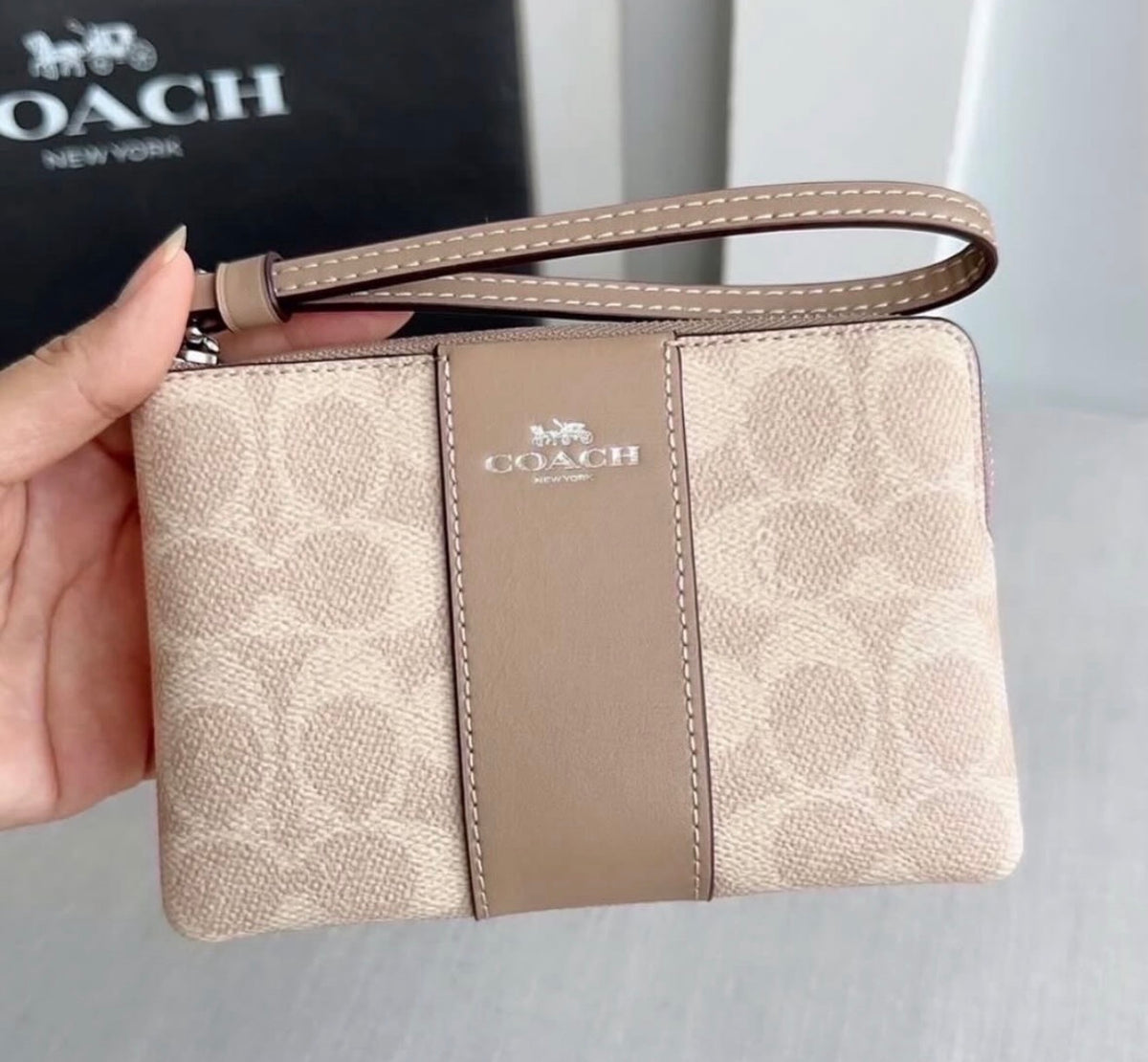 Coach Corner Zip Wristlet In Signature Canvas With Stripe - Beige