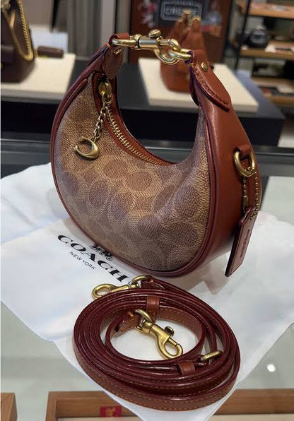 Coach Jonie Mini Signature Canvas Bag - Brown