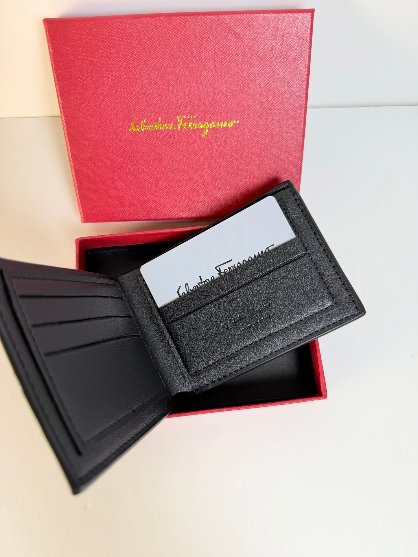 Salvatore Ferragamo Gancini Embosssed Wallet - Black