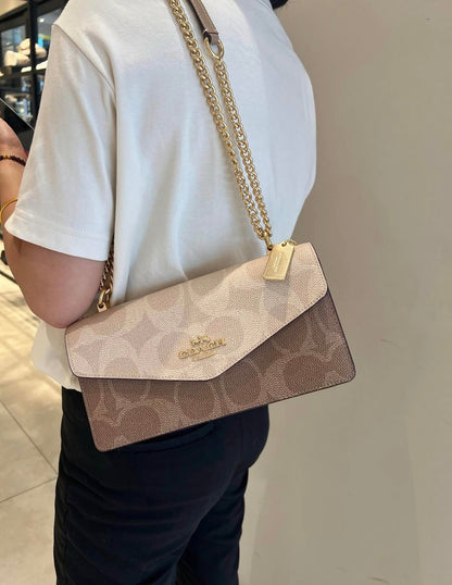 Coa*h Klare Envelope Crossbody Bag in Signature Canvas