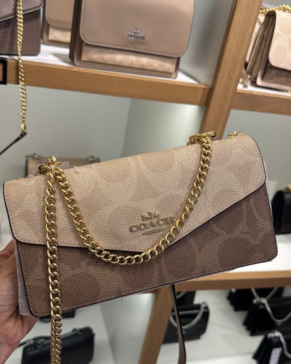 Coa*h Klare Envelope Crossbody Bag in Signature Canvas