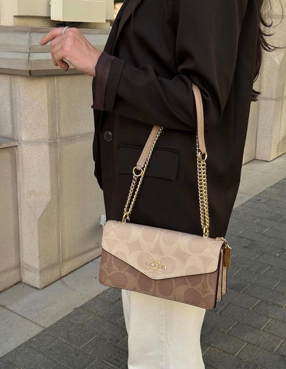 Coa*h Klare Envelope Crossbody Bag in Signature Canvas